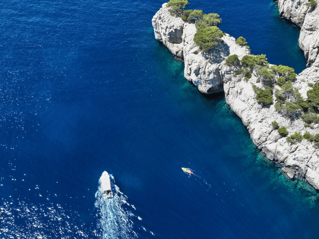 Calanques de Cassis with boat in the water