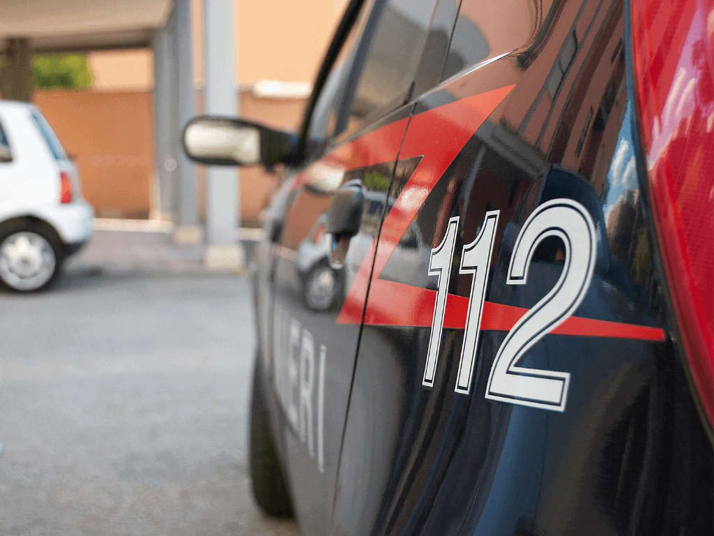 Italian police car with 112 emergency number displayed