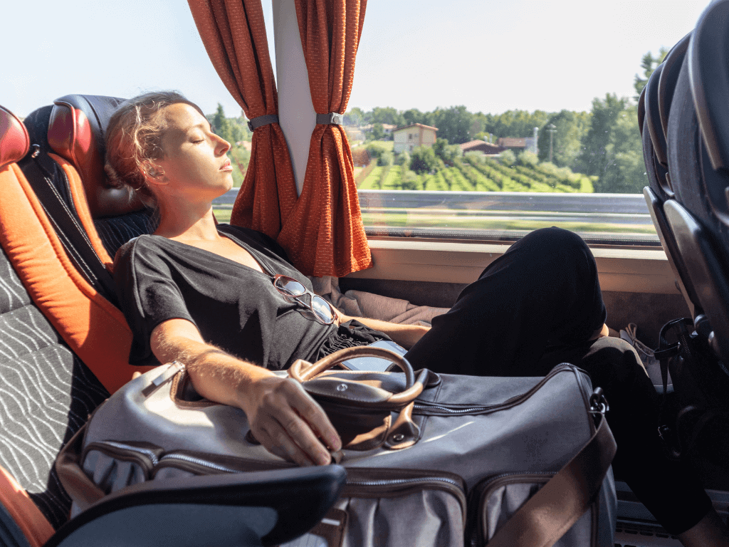 woman relaxing on coach bus