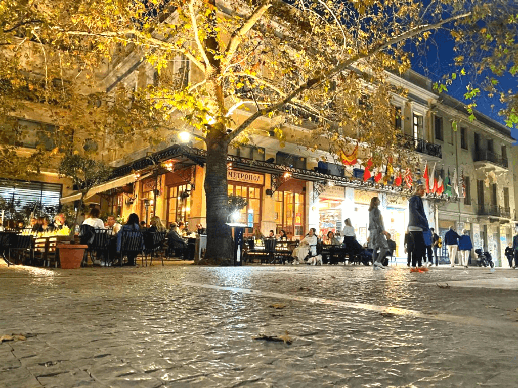 illuminated cafe at night in Athens