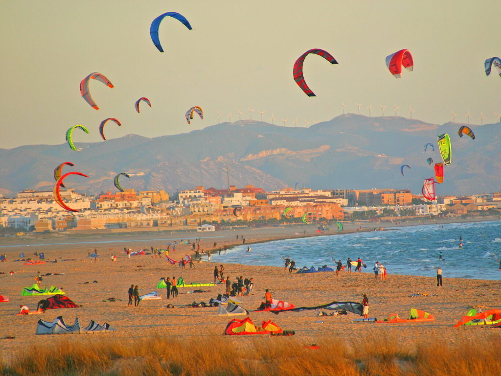 Brightly-colored kites from kitesurfers in Tarifa