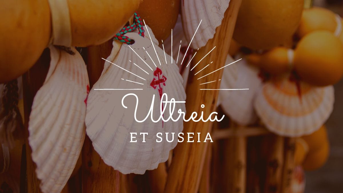 shells with the cross of st james hanging from wooden walking sticks with the words ultreia et suseia overlaid on top